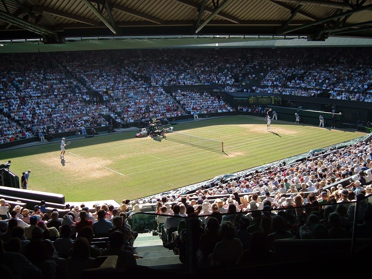 Wimbledon Centre Court — Roger Federer serving, 2006